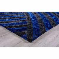 5’ x 7’ Blue and Gray Geometric Illusion Area Rug