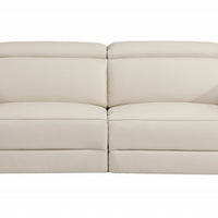 83" Beige Italian Leather and Chrome Reclining Sofa