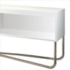 53 Inch TV Stand With 2 Open Compartments And Tubular Metal Frame, White And Chrome - UPT-238274